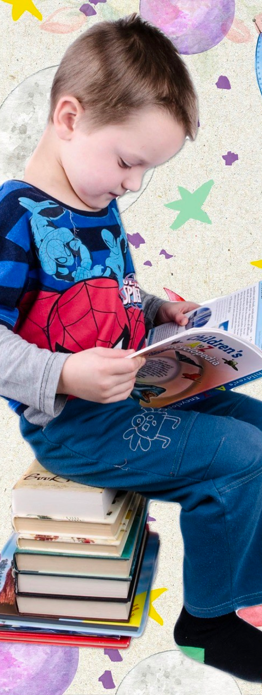 Little boy reading book