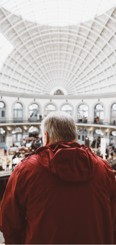Man looking out on the museum